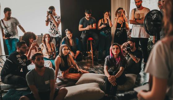 Group of people listening to author talk